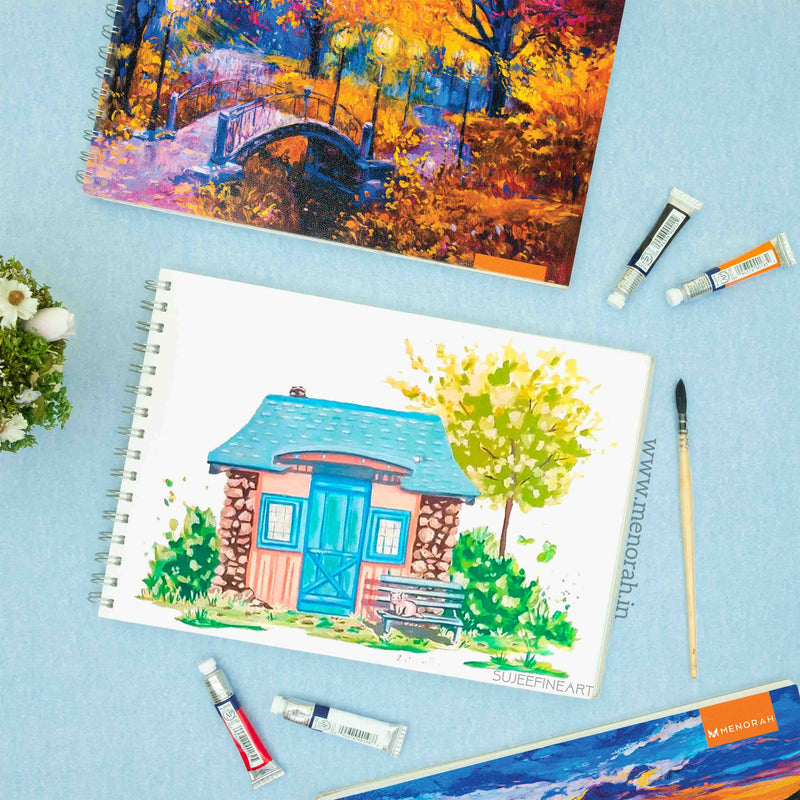Small Blue cottage in the middle of the forest painting on a4 size sketchbook, 140 gsm sketchbook, artist sketchbook.