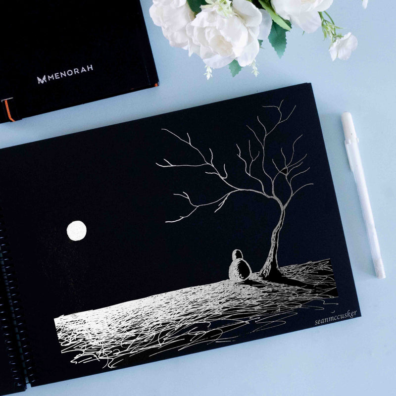 Drawing Moonlight with White pencil on black sketchbook. 250 GSM true black sketchbook. Menorah sketchbook.