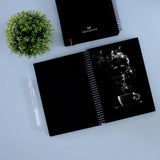 Drawing steaming coffee on black sketchbook. 250 GSM True black sketchbook.