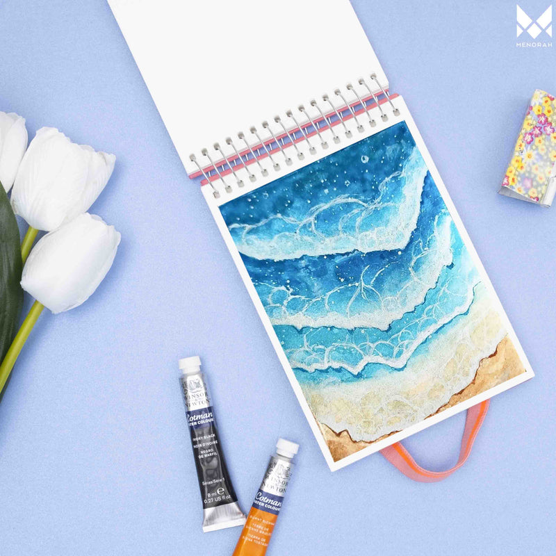 Beautiful seashore watercolor painting on A6 size watercolor sketchbook is the best travel accompanion for the creators. Watercolor sketchbook is made of 100% cotton and is 100% Vegan. It contains 40 pages with a 300GSM Thickness so that watercolor won't penetrate to the other page. It is covered by Metal spiral with 360 Degree easy turn. Make your creations by using watercolour paintings, Acrylics, Gouache, Tempera, Poster colour in this sketchbook. Bright Blue color sketchbook